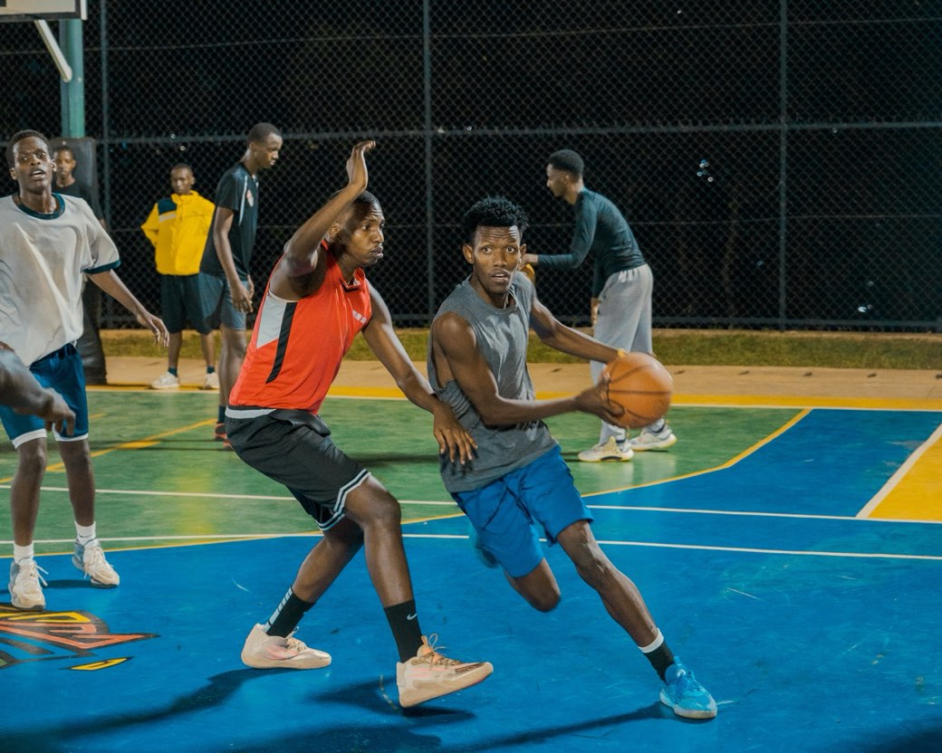 Players in a street basketball game at an Ukurikira: Who&rsquo;s Got Next? session